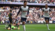 Tottenham Hotspur's South Korean striker #07 Son Heung-Min celebrates scoring the team's fourth goal during the English Premier League football match between Tottenham Hotspur and Everton at the Tottenham Hotspur Stadium in London, on August 24, 2024. (Photo by HENRY NICHOLLS / AFP) 