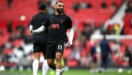 Liverpool's Egyptian striker #11 Mohamed Salah warms up ahead of the English Premier League football match between Manchester United and Liverpool at Old Trafford in Manchester, north west England, on September 1, 2024. Photo by Paul ELLIS / AFP.