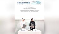 Qatar Foundation and Seashore Group officials during the agreement signing ceremony. 