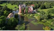 This aerial view shows Bad Muskau palace in the landscape park in Bad Muskau, near Goerlitz in eastern Germany on August 22, 2024. (Photo by Tobias SCHWARZ / AFP)