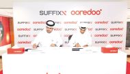 Director of Public Relations, Social Responsibility, and Sponsorships at Ooredoo Qatar Sabah Rabiah Al Kuwari and Suffix’s General Manager Ahmad Al Majed signing the agreement.