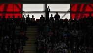 Supporters cheer during the English Premier League football match between Southampton and Manchester United at St Mary's Stadium in Southampton, southern England on September 14, 2024. (Photo by Glyn KIRK / AFP)