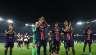 Paris Saint-Germain's players acknowledge the crowd at the end of the UEFA Champions League 1st round day 1 football match between Paris Saint-Germain (PSG) and Girona FC at the Parc des Princes Stadium, in Paris, on September 18, 2024. (Photo by Franck Fife / AFP)