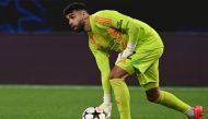 Arsenal's Spanish goalkeeper #22 David Raya passes the ball during the UEFA Champions League 1st round day 1 football match between Atalanta Bergamo and Arsenal at the Atleti Azzurri d'Italia stadium in Bergamo on September 19, 2024. (Photo by Isabella Bonotto / AFP)