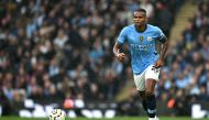 Manchester City's Swiss defender #25 Manuel Akanji runs with the ball during the English Premier League football match between Manchester City and Arsenal at the Etihad Stadium in Manchester, north west England, on September 22, 2024. (Photo by Paul ELLIS / AFP) /