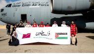 A file photo of a Qatari Armed Forces aircraft carrying humanitarian aid donated by the Qatar Fund For Development and Qatar Red Crescent Society for Gaza, in Al Arish, Egypt.