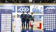 Sheikh Ahmed bin Nooh Al Thani, Chairman of the Supreme Organizing Committee of the tournament poses for a photo with the Big Tour podium winners.
