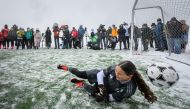 Photo used for demonstration purposes. Team Europe Ambassador goalkeeper Madlaina Riesch tries to deflect a ball on a fooball pitch set at 3,454m above sea level in Aletsch glacier in the Swiss Alps, during an event launching the ticket sales for UEFA Women’s EURO 2025 football tournament, at the Jungfraujoch, on October 1, 2024. Photo by Fabrice COFFRINI / AFP.