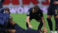 Juventus' Brazilian defender #03 Bremer lies on the football pitch after picking up an injury during the UEFA Champions League football match between RB Leipzig and Juventus FC at the Red Bull Arena in Leipzig on October 2, 2024. (Photo by Ronny HARTMANN / AFP)