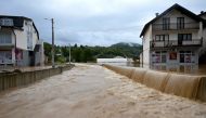 A picture taken in the town of Kiseljak, about twenty kilometres west of Sarajevo on October 4, 2024 shows a flooded street following heavy rains. Photo by Elvis BARUKCIC / AFP