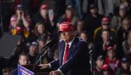 Republican presidential nominee former President Donald Trump speaks during a rally at Dodge County Airport on October 06, 2024 in Juneau, Wisconsin (Photo by SCOTT OLSON / GETTY IMAGES NORTH AMERICA / Getty Images via AFP)
