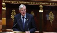 French Prime Minister Michel Barnier delivers a speech during a vote on no confidence motion during a parliamentary session at The National Assembly in Paris on October 8, 2024. (Photo by Thomas Samson / AFP)