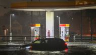 A vehicle stranded on a water-flooded street after Hurricane Milton made landfall in Brandon, Florida on October 9, 2024. (Photo by Miguel J. Rodriguez Carrillo / AFP)