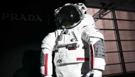 The AxEMU suit is pictured during a press conference of Prada and Axiom Space, as part of the presentation of the Axiom Extravehicular Mobility Unit designed and developed for the Artemis 3 lunar mission in collaboration with Prada, at the MiCo Convention Centre in Milan, northern Italy, on October 16, 2024. Photo by MARCO BERTORELLO / AFP
