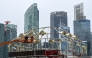 File photo for representation showing construction workers near Singapore's financial business district. AFP.