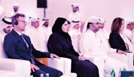Minister of Social Development and Family H E Maryam bint Ali bin Nasser Al Misnad (second left) and other officials at the event.