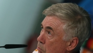 Real Madrid's Italian coach Carlo Ancelotti gives a press conference at the Valdebebas training ground in Madrid on October 21, 2024 on the eve of the UEFA Champions League, league phase day 3 football match between Real Madrid CF and Borussia Dortmund. (Photo by Pierre-Philippe MARCOU / AFP)
