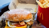 A double quarter pounder with cheese and fries arranged at a McDonald's restaurant in El Sobrante, California, on Oct. 23. Photo credit: David Paul Morris/Bloomberg