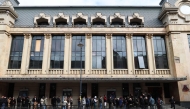 Georgians queue outside a polling station to vote in the country's parliamentary elections in Tbilisi on October 26, 2024. (Photo by Giorgi ARJEVANIDZE / AFP)
