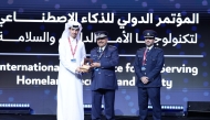 Milipol Qatar Committee Chairman Major General Nasser bin Fahad Al Thani honouring Director of Cyber Security Strategies and Policies at NCSA Abdulrahman Al Shafi at the event. 