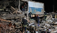 Rescuers of the State Emergency Service inspect the remains of a residential building after a strike in Kharkiv, on November 1, 2024. Photo by SERGEY BOBOK / AFP