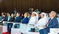 Minister of Communications and Information Technology H E Mohammed bin Ali Al Mannai (third right) with other officials during the event.