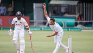 South Africa's Dane Paterson delivers a ball during the second day of the second international Test cricket match between South Africa and Sri Lanka at St Georges Park in Gqeberha on December 6, 2024. (Photo by Marco Longari / AFP)
