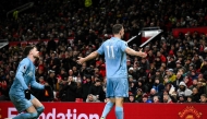 Nottingham Forest's New Zealand striker #11 Chris Wood celebrates after scoring his team third goal during the English Premier League football match between Manchester United and Nottingham Forest at Old Trafford in Manchester, north west England, on December 7, 2024. (Photo by Oli SCARFF / AFP)