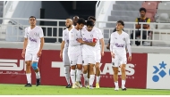 Al Khor captain Ahmad Hassan Al Mohannadi celebrates with teammates after scoring their first goal.