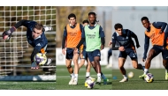 Real Madrid's Vinicius Junior (right) and Jesus Vallejo in action during a training session in Madrid yesterday. Photos by Real Madrid