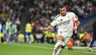 Real Madrid's French forward #09 Kylian Mbappe controls the ball during the Spanish league football match between Real Madrid CF and Deportivo Alaves at the Santiago Bernabeu stadium in Madrid on September 24, 2024. (Photo by JAVIER SORIANO / AFP)
