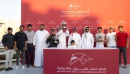 The connections of Al Judhay Cup winner Sidi Star celebrate with the trophy. Pictures: JUHAIM/QREC