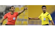 Qatari referees Abdulrahman Al Jassim (right) and Salman Falahi 