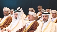 Minister of Commerce and Industry H E Sheikh Faisal bin Thani bin Faisal Al Thani with other dignitaries at the the Oman-Qatar Economic Forum in Muscat, yesterday.