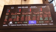Stock market numbers are displayed at the New York Stock Exchange during morning trading on February 03, 2025 in New York City. (Photo by Michael M. Santiago / GETTY IMAGES NORTH AMERICA / Getty Images via AFP)
