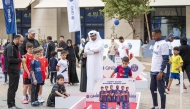Children take part in an activity organised by QNB Group at Msheireb Downtown Doha to mark National Sport Day. 