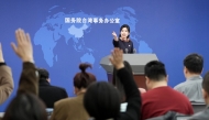 Zhu Fenglian, spokesperson for the State Council Taiwan Affairs Office, gestures at a regular press conference in Beijing, capital of China, Feb. 12, 2025. (Xinhua/Chen Yehua)
