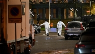 Forensic police officers work at the scene of the Risbergska School in Orebro, Sweden, on February 4, 2025, following reports of a serious violent crime. (Photo by Pontus Lundahl / TT News Agency / AFP)


