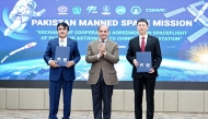 Muhammad Yousuf Khan (L), chairman of the Pakistan Space and Upper Atmosphere Research Commission (SUPARCO), and Lin Xiqiang (R), deputy director of the China Manned Space Engineering Office (CMSEO), pose for a photo with Pakistani Prime Minister Shehbaz Sharif during the exchange of cooperation agreement on the spaceflight of Pakistani astronaut to the Chinese space station in Islamabad, capital of Pakistan on Feb. 28, 2025. (Xinhua/Ahmad Kamal)
