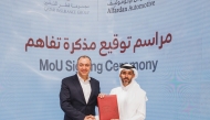 Group CEO of QIC, Salem Al Mannai and CEO of Alfardan Automotive, Dr. Ma’n Alhamawi during the signing of the agreement.