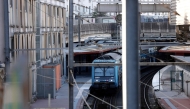 This photograph shows a regional train parked at a platform as traffic has been stopped at the Gare du Nord station in Paris on March 7, 2025, following the discovery of a World War II bomb. Photo by GEOFFROY VAN DER HASSELT / AFP
