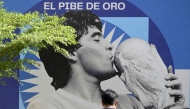 An image of late football star Diego Maradona is seen on the 2nd anniversary of his death at CONMEBOL fan zone 