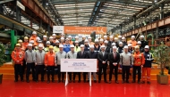 Officials during the steel cutting ceremony of its new LNG carriers.