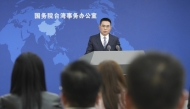 Chen Binhua, spokesperson for the Taiwan Affairs Office of the State Council, answers questions at a regular press conference in Beijing, capital of China, March 12, 2025. (Xinhua/Chen Yehua)
