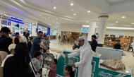 Families throng a booth set up by Mowasalat as part of Garangao celebrations.  