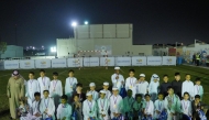 Children taking part in QM Kids Ramadan Football Tournament with their medals. 