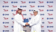 Group Chief Business Officer at QNB, Yousef Mahmoud Al Naema with Chief Executive Officer, QLM Life & Medical Insurance Company, Fahad Al Suwaidi.