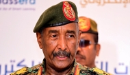 (FILES) Sudan's army chief General Abdel Fattah Al-Burhan addresses the conference to support initiatives for e-learning projects and the enrichment of education infrastructure in the Darfur region and the launch of smart education platforms, in Port Sudan on February 17, 2025. (Photo by AFP)