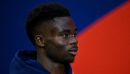 Arsenal's English midfielder #07 Bukayo Saka arrives for the English Premier League football match between Crystal Palace and Arsenal at Selhurst Park in south London on December 21, 2024. (Photo by Glyn KIRK / AFP