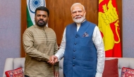 In this handout photograph taken on April 5, 2025 and released by Sri Lanka's President office, Sri Lanka's President Anura Kumara Dissanayake (L) shakes hands with India's Prime Minister Narendra Modi after a bilateral meeting at the president's office in Colombo. (Photo by Sri Lanka's President Office / AFP) 